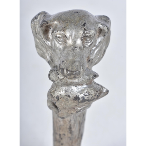 3066 - An antique Spelter and bronze seal in the form of a dog 12cm.