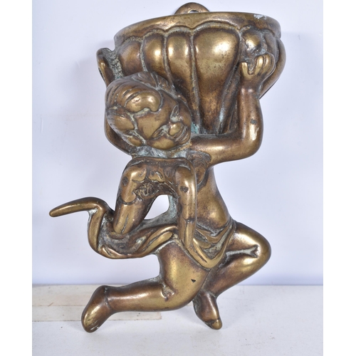 3083 - A vintage cold painted money box together with a small brass font, metal figure of a girl etc 15cm