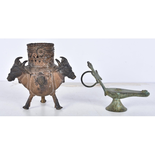 3095 - An early Central Asian bronze burner together with a small bronze oil lamp 11cm (2)