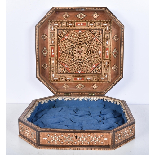 3107 - A central Asian octagonal mother of pearl marquetry box 9 x 32 x 32 cm