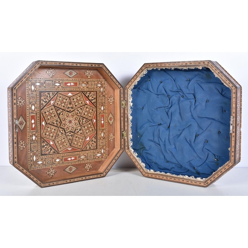 3107 - A central Asian octagonal mother of pearl marquetry box 9 x 32 x 32 cm