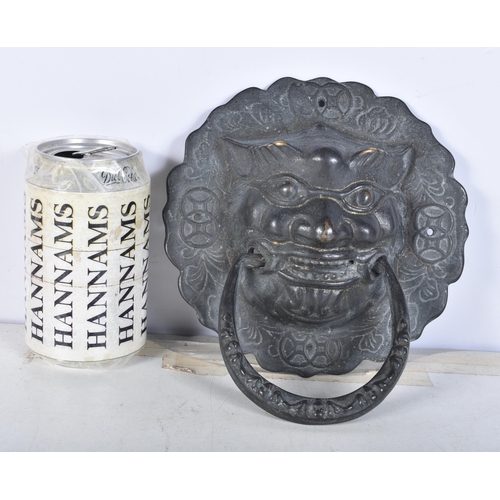 3110 - A Chinese beast head bronze door knocker 19 x 16.5 cm