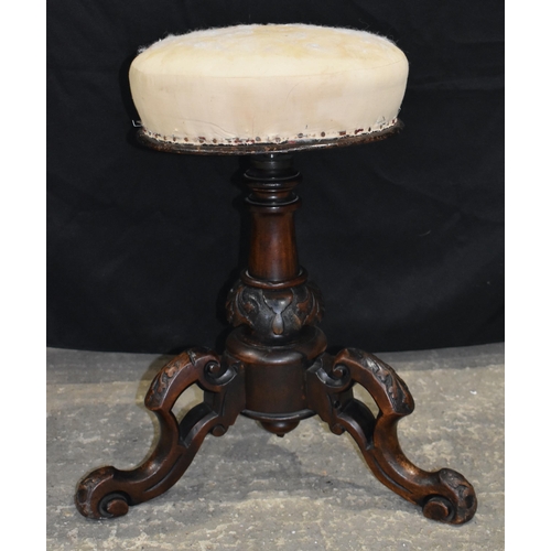 3234 - A Victorian Joseph Fitter revolving Piano stool 56cm