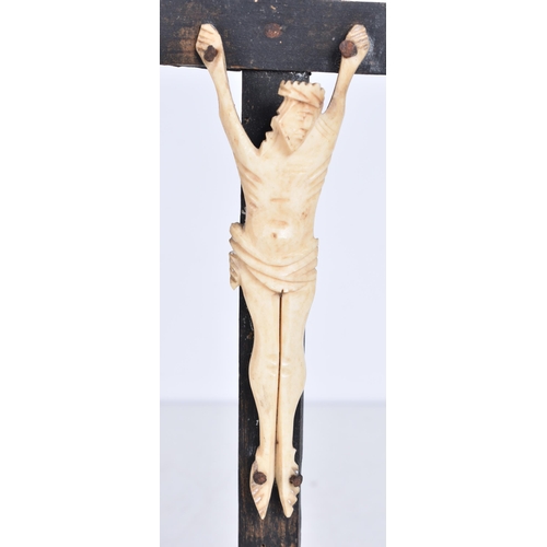 3250 - A Napoleonic prisoner of war carved lamb bone Corpus Christi 24cm.