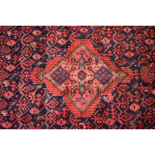 3257 - A hand knotted Persian Long rug 298 x 142