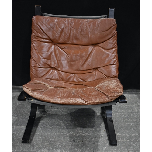 3375 - A Norwegian West Nova wooden and leather armchair 82 x 61 cm