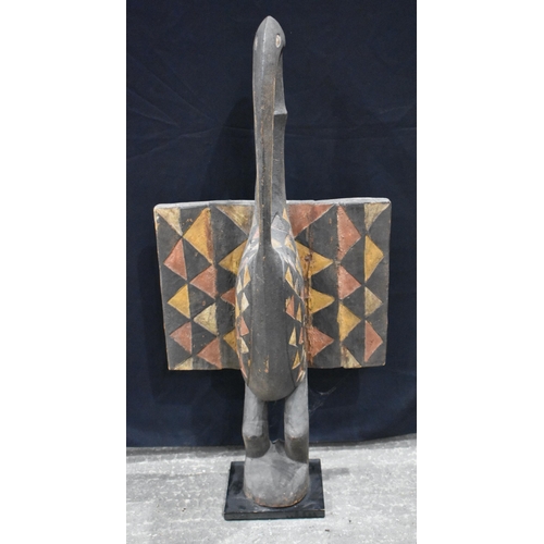 3376 - An African Tribal Senufu wood bird sculpture 120 x 59cm.