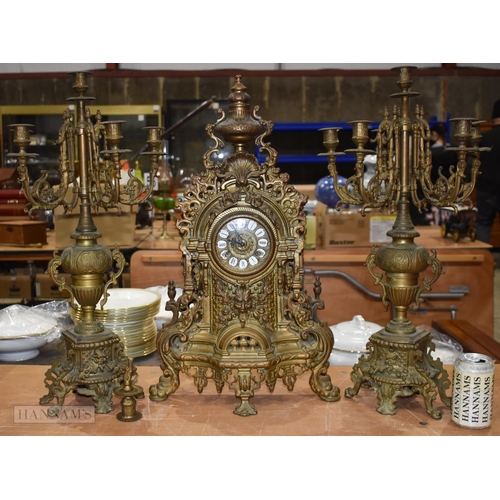 3631 - A Gilt metal Louis XIV style clock set 61cm (3)