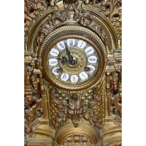 3631 - A Gilt metal Louis XIV style clock set 61cm (3)