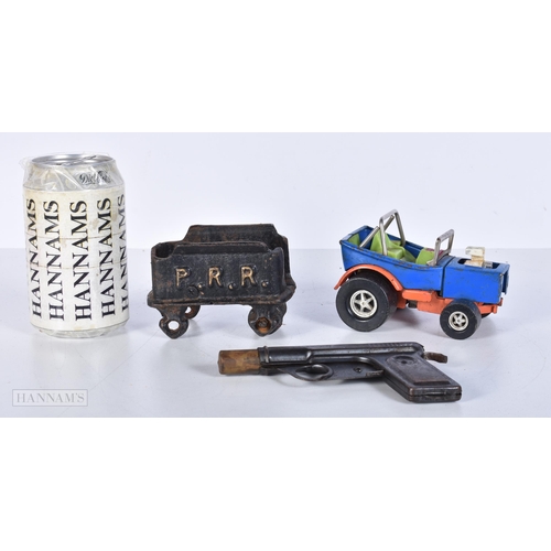 3638 - An antique toy water pistol together with an early cast iron Pacific Railroad model railway stock an... 