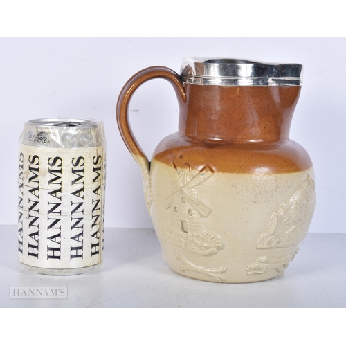 3640 - A 19th Century Salt glaze jug with a silver mounted rim by George Fox 1864 17cm