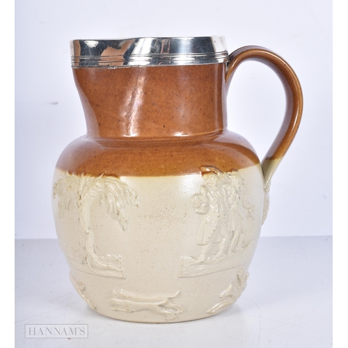 3640 - A 19th Century Salt glaze jug with a silver mounted rim by George Fox 1864 17cm