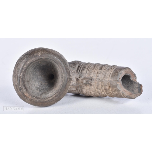 3645 - A Pre Colombian stoneware pipe. 