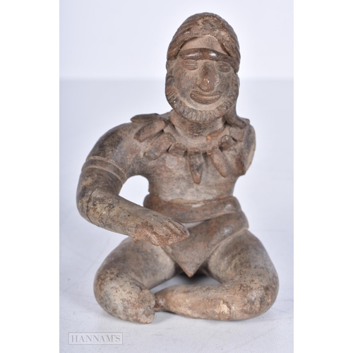 3646 - An early South American stoneware figural votive 10cm