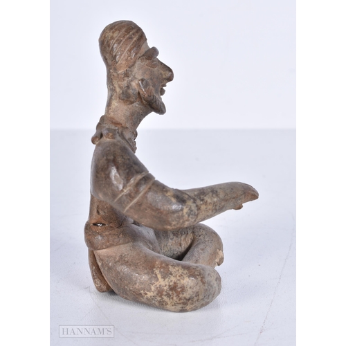 3646 - An early South American stoneware figural votive 10cm