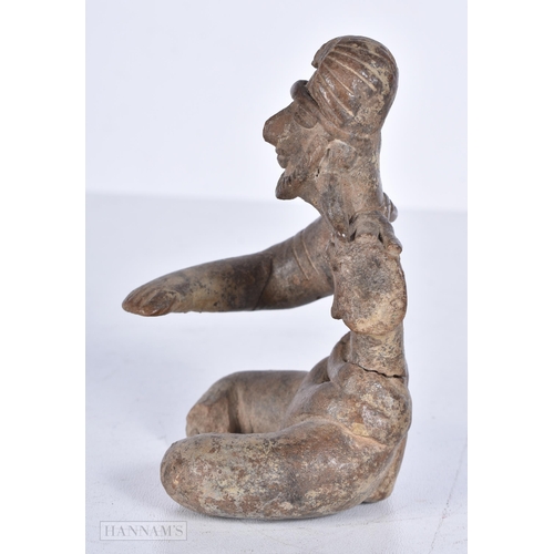 3646 - An early South American stoneware figural votive 10cm