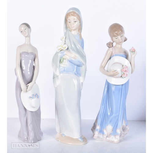 3649 - A collection of Lladro figurines 24cm (8).