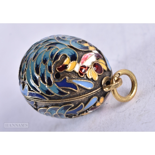 3905 - A Continental Silver and Enamel Egg Pendant. Stamped 84. 2.8cm x 1.8cm, weight 5.3g