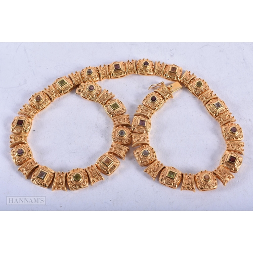 3909 - A Silver Gilt Necklace set with Gems. Stamped 925, 44cm long, weight 70g