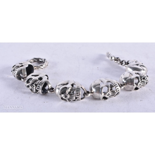 3910 - A Silver Skull Bracelet. Stamped 925. Length 20.5cm, weight 44.3g