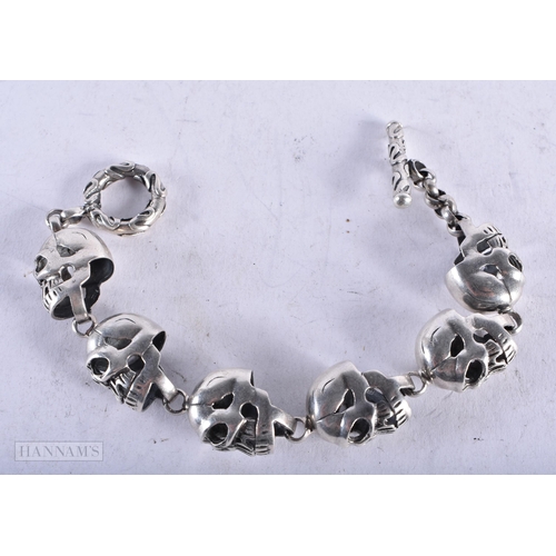 3910 - A Silver Skull Bracelet. Stamped 925. Length 20.5cm, weight 44.3g