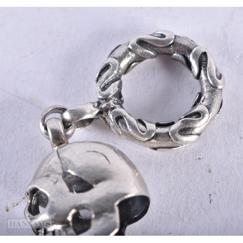 3910 - A Silver Skull Bracelet. Stamped 925. Length 20.5cm, weight 44.3g