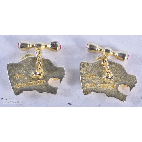 3914 - A Pair of Continental Silver Gilt Dog's Head Cufflinks. Stamped 88. 2.4cm x 1.9cm, weight 19g