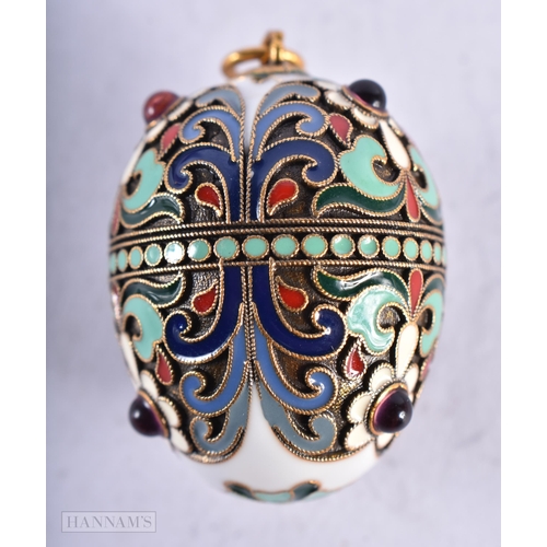 3921 - A Continental Silver and Enamel Egg Pendant. Stamped 84, 3.7cm x 2.6cm, weight 13.5g