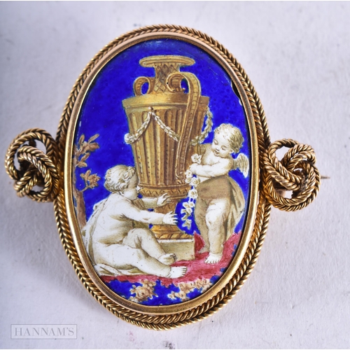 3922 - An Antique 18 Carat Gold and Enamel Cherub Brooch. 4.5cm x 4.4cm, weight 23.2g