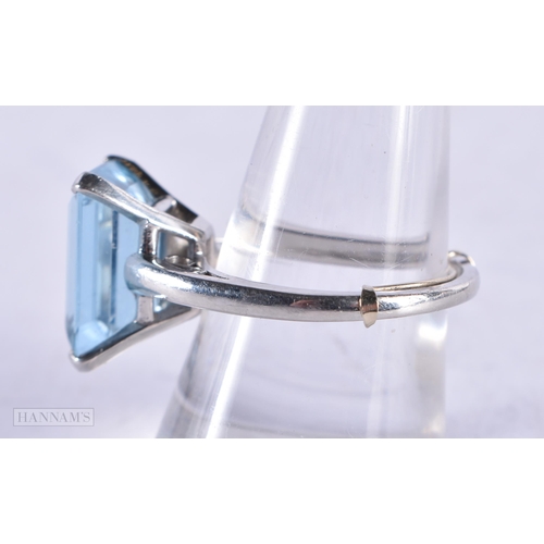 3928 - A Platinum Ring set with an Aquamarine. Stamped 10% IRID PLAT. Size P, weight 8.6g