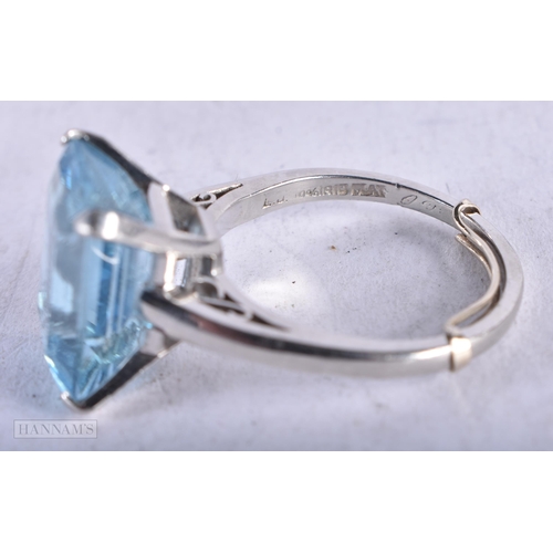 3928 - A Platinum Ring set with an Aquamarine. Stamped 10% IRID PLAT. Size P, weight 8.6g