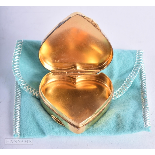 3995 - A Tiffany & Co Silver Gilt Heart Box in a Pouch. Stamped Tiffany & Co Italy 925. 4.8cm x 4.7cm, weig... 