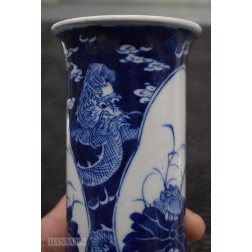 2074 - A 19TH CENTURY CHINESE BLUE AND WHITE PORCELAIN VASE bearing Kangxi marks to base. 21 cm high.