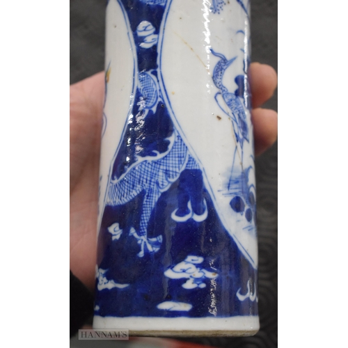 2074 - A 19TH CENTURY CHINESE BLUE AND WHITE PORCELAIN VASE bearing Kangxi marks to base. 21 cm high.