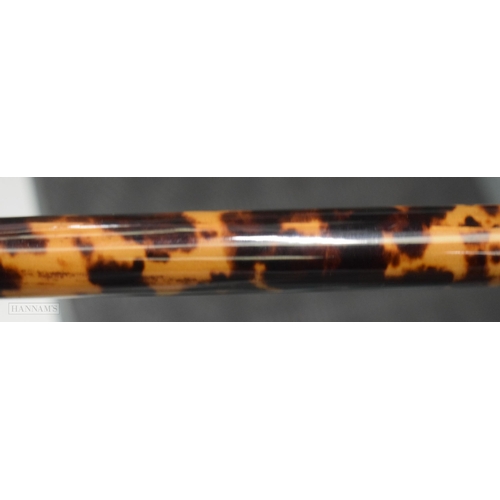 291 - AN EARLY VICTORIAN YELLOW METAL MOUNTED TORTOISESHELL WALKING CANE. 91 cm long.