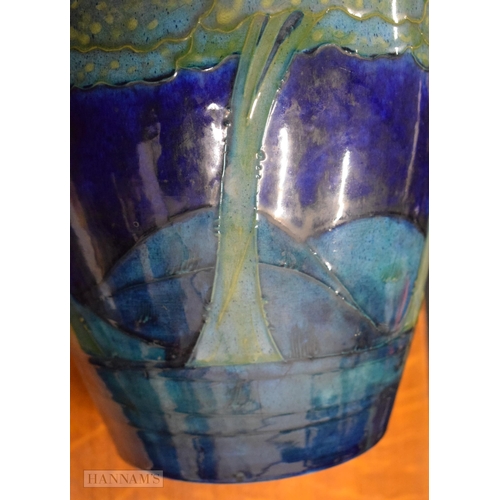 35B - A FINE AND RARE PAIR OF MOORCROFT MOONLIT BLUE VASES C1930 of unusually large scale. 32 x 22 cm  (2)