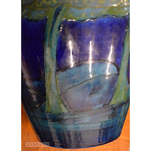 35B - A FINE AND RARE PAIR OF MOORCROFT MOONLIT BLUE VASES C1930 of unusually large scale. 32 x 22 cm  (2)