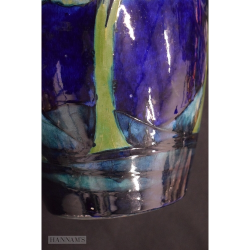 35B - A FINE AND RARE PAIR OF MOORCROFT MOONLIT BLUE VASES C1930 of unusually large scale. 32 x 22 cm  (2)