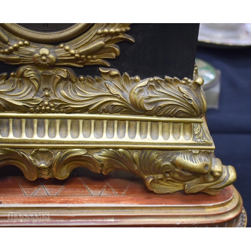 361 - A 19TH CENTURY FRENCH ORMOLU AND BRONZE AUTOMATON CLOCK formed with Napoleon over looking a boat. 46... 