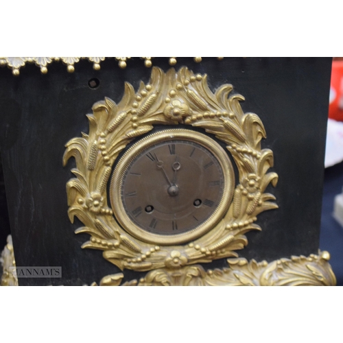 361 - A 19TH CENTURY FRENCH ORMOLU AND BRONZE AUTOMATON CLOCK formed with Napoleon over looking a boat. 46... 