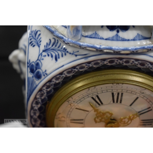 423 - A RARE DANISH ROYAL COPENHAGEN PORCELAIN CLOCK. 27 cm x 15 cm.