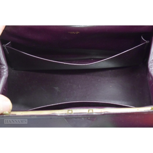 666 - A HERMES LEATHER BAG. 26 cm x 24 cm excluding handle.