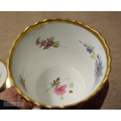 847 - Early 19th century two Chamberlains cups and saucers with gadroon border painted with flowers and t... 