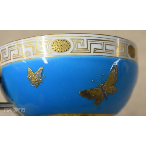 856 - Pre-1891 Minton teacup, the turquoise ground decorated in gold and platinum with wild plants and but... 