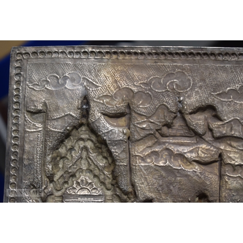 25D - A RARE LARGE 19TH CENTURY INDIAN BURMESE SILVER REPOUSSE PLAQUE decorated with numerous figures in v... 