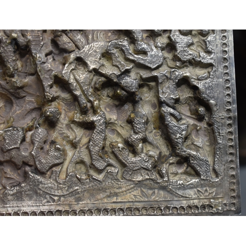 25D - A RARE LARGE 19TH CENTURY INDIAN BURMESE SILVER REPOUSSE PLAQUE decorated with numerous figures in v... 