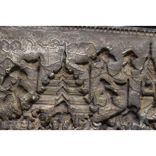 25D - A RARE LARGE 19TH CENTURY INDIAN BURMESE SILVER REPOUSSE PLAQUE decorated with numerous figures in v... 