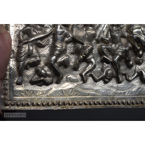 25D - A RARE LARGE 19TH CENTURY INDIAN BURMESE SILVER REPOUSSE PLAQUE decorated with numerous figures in v... 