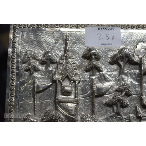 25D - A RARE LARGE 19TH CENTURY INDIAN BURMESE SILVER REPOUSSE PLAQUE decorated with numerous figures in v... 