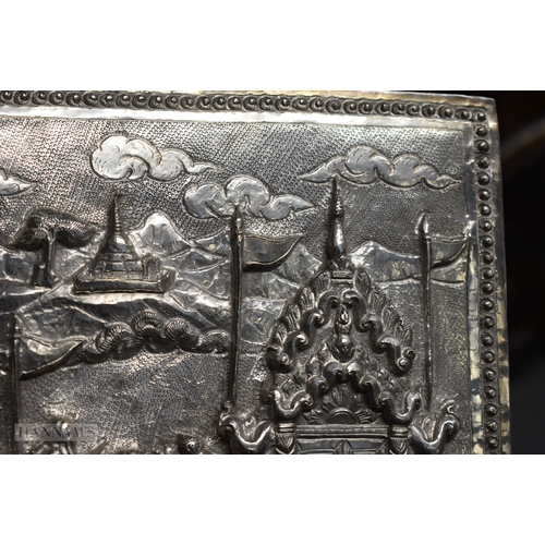 25D - A RARE LARGE 19TH CENTURY INDIAN BURMESE SILVER REPOUSSE PLAQUE decorated with numerous figures in v... 